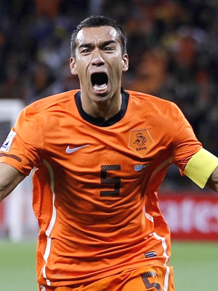 Ex-jogador Giovanni van Bronckhorst, em partida pela seleção da Holanda  - Carlos Barria/Reuters